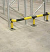 Racking leg protection set into the finished floor