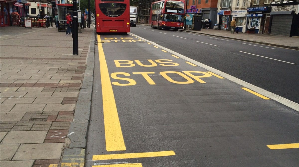 Bus holding area with red surfaced bays, Newham